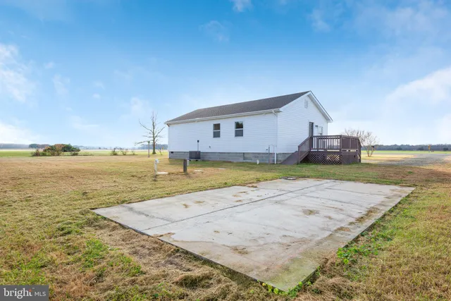 a view of a swimming pool with an ocean view