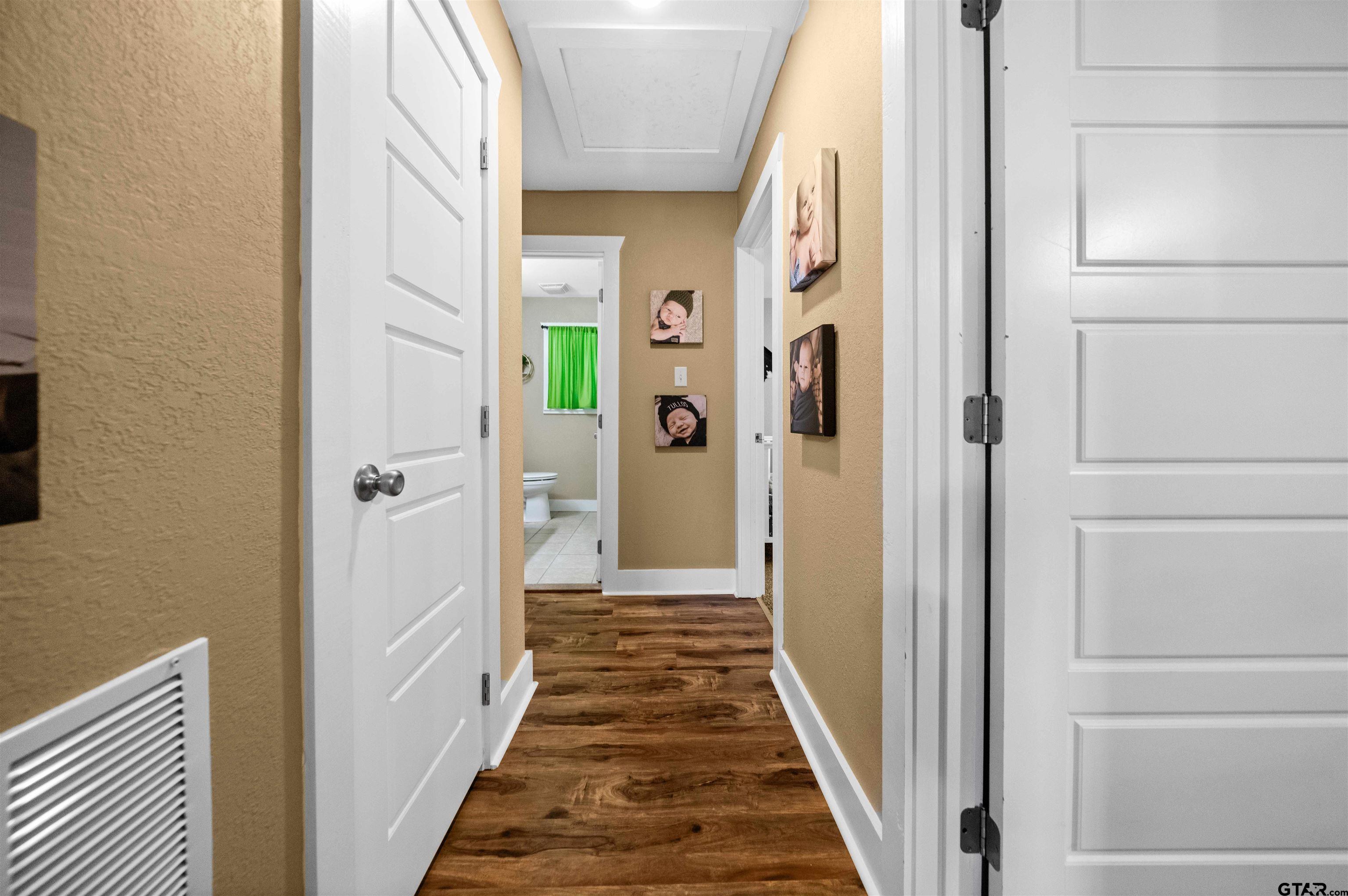 8781 Farm To Market 59 Athens, TX 75751 - Photo 27 of 37 a view of a hallway with a wooden door