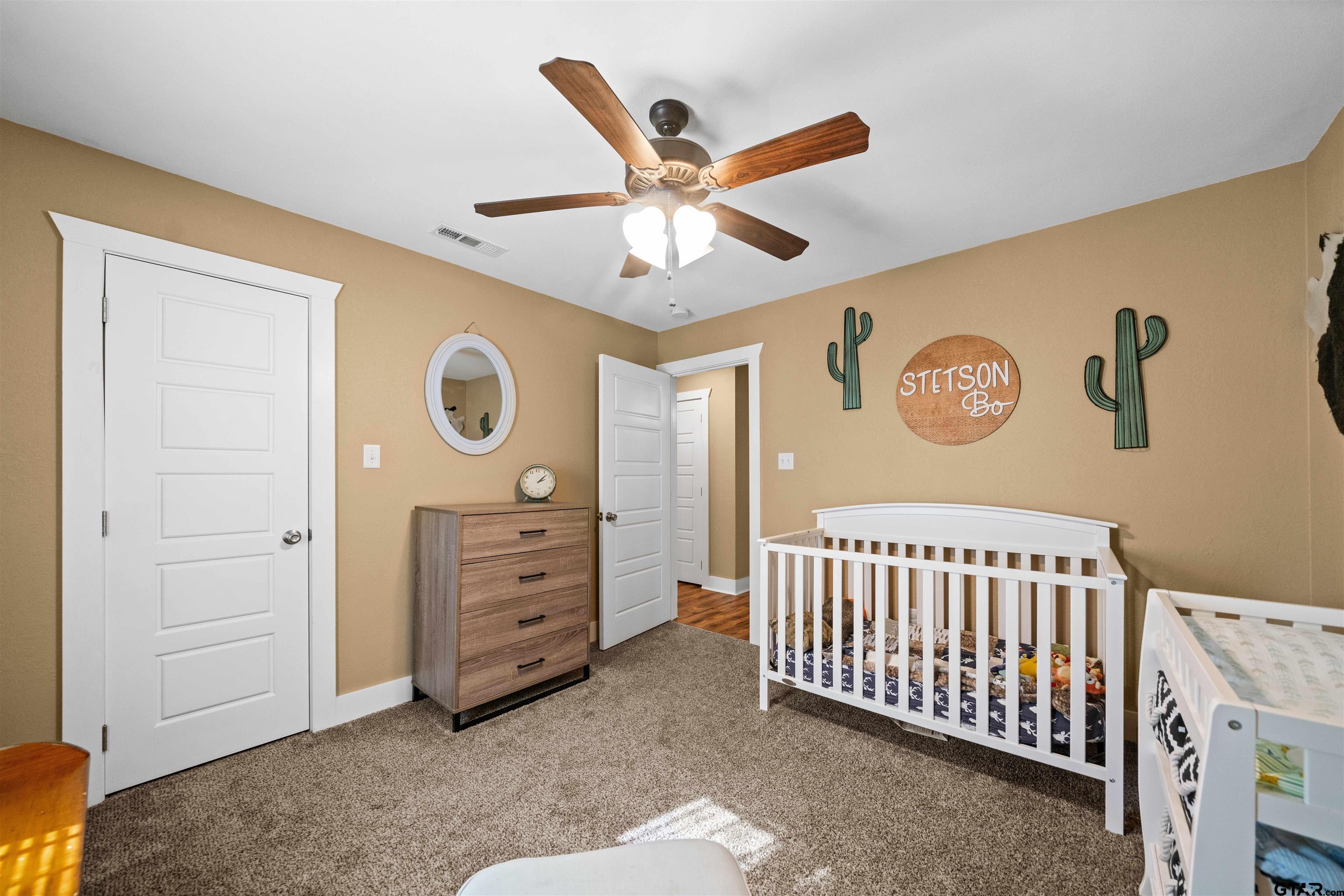 8781 Farm To Market 59 Athens, TX 75751 - Photo 30 of 37 a living room with furniture and a ceiling fan