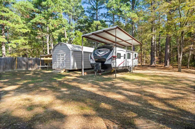 a view of a playground with basketball court