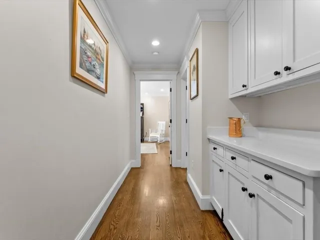 a hallway with cabinets