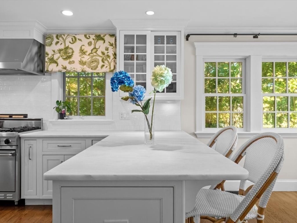 25 Forest Street Manchester, MA 01944 - Photo 7 of 34 a kitchen with a table chairs and a window