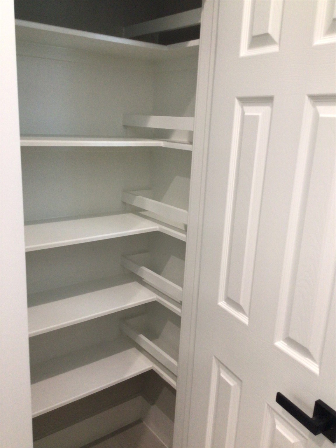 2109 Marnel Road, Unit B Houston, TX 77055 - Photo 14 of 46 a view of walk in closet with empty racks