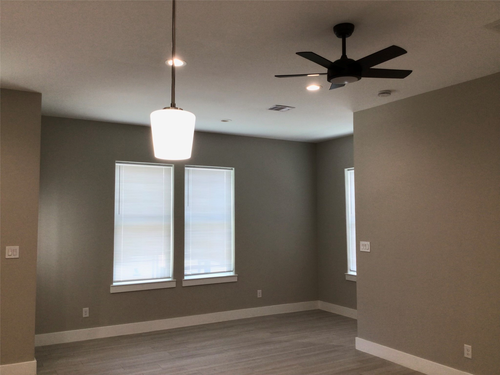 2109 Marnel Road, Unit B Houston, TX 77055 - Photo 16 of 46 a view of an empty room with wooden floor and a window