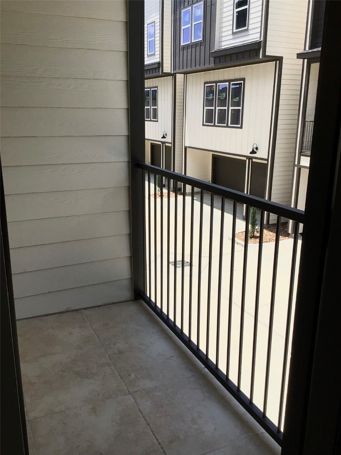 2109 Marnel Road, Unit B Houston, TX 77055 - Photo 21 of 46 a view of a balcony with a door