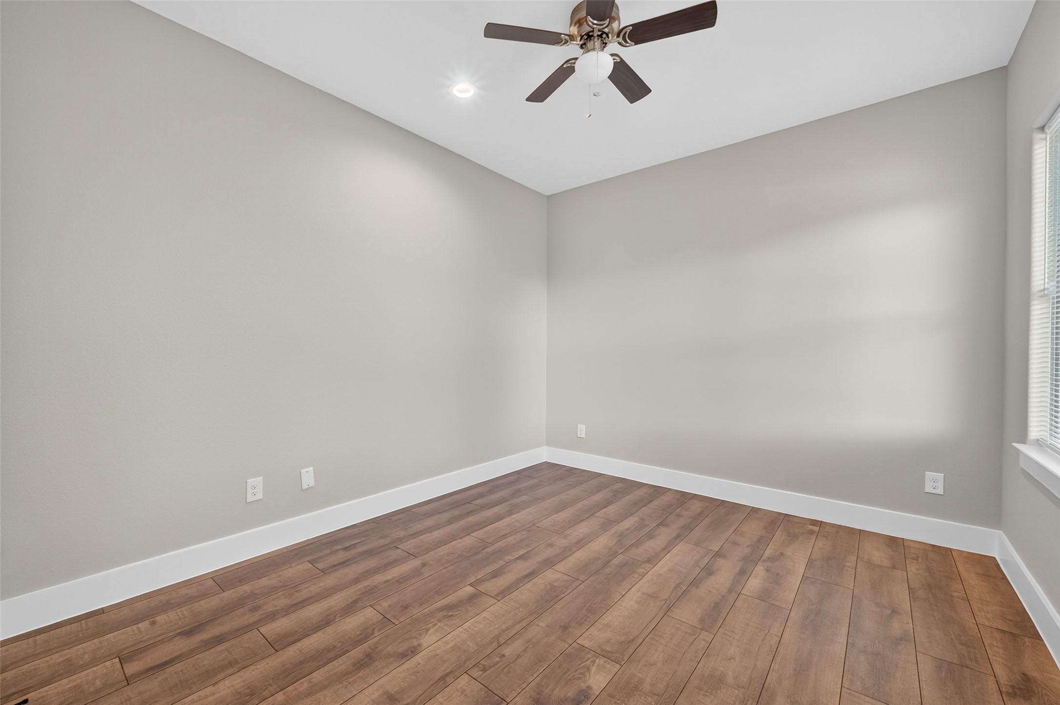 2109 Marnel Road, Unit B Houston, TX 77055 - Photo 39 of 46 wooden floor in an empty room with a window