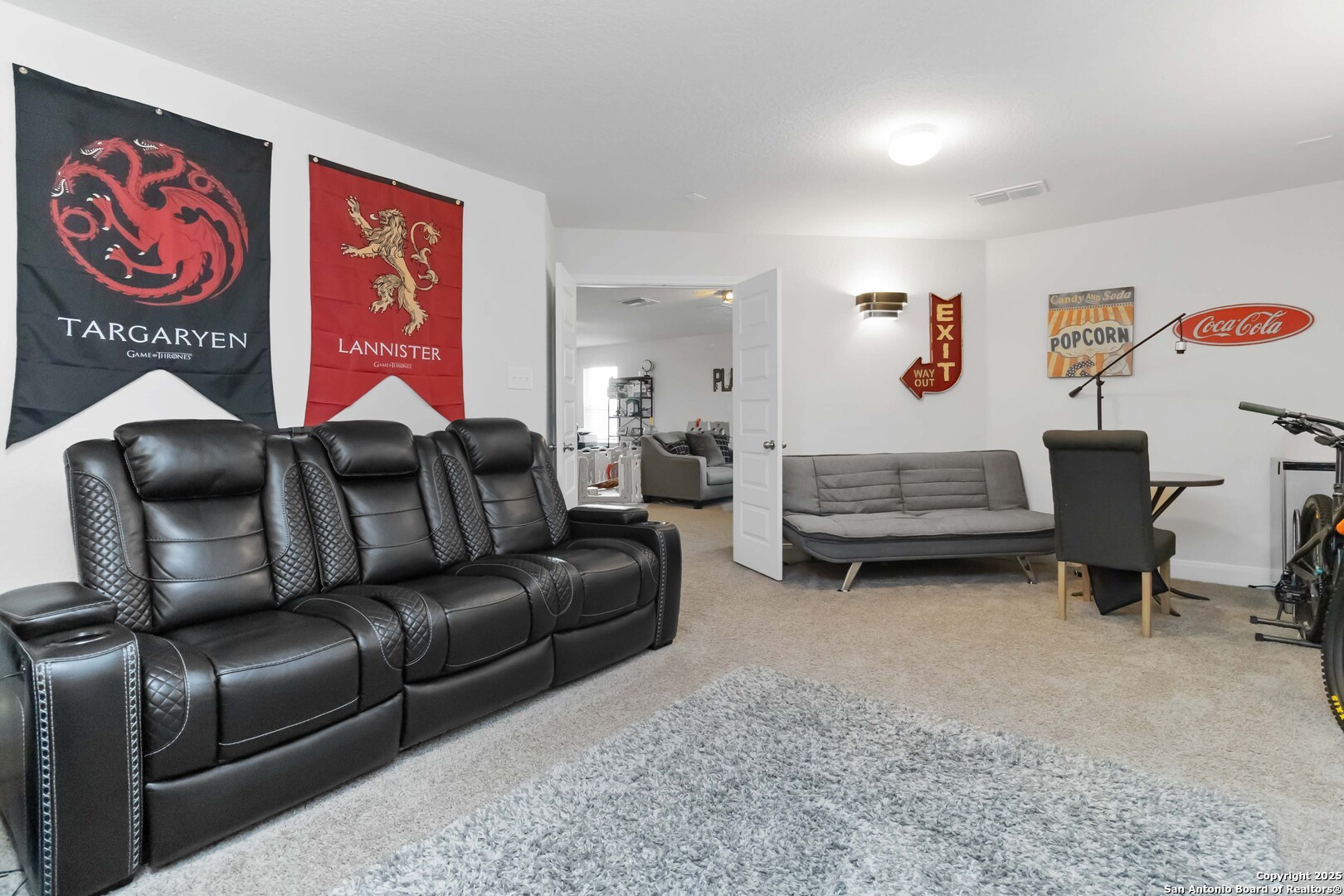 3335 Iron Canyon Bulverde, TX 78163 - Photo 12 of 17 a living room with furniture and a refrigerator