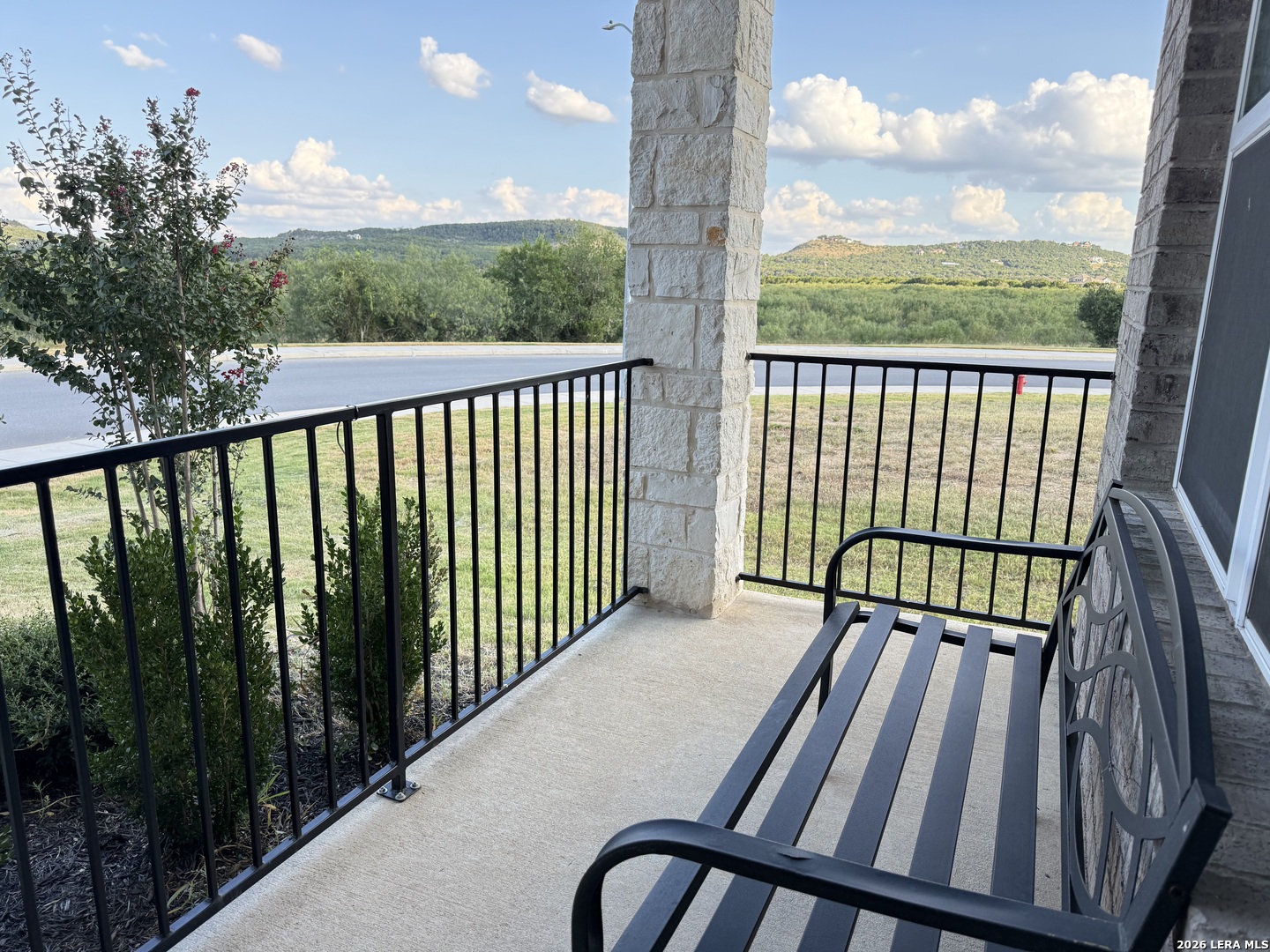 3335 Iron Canyon Bulverde, TX 78163 - Photo 2 of 17 a view of a balcony with wooden floor
