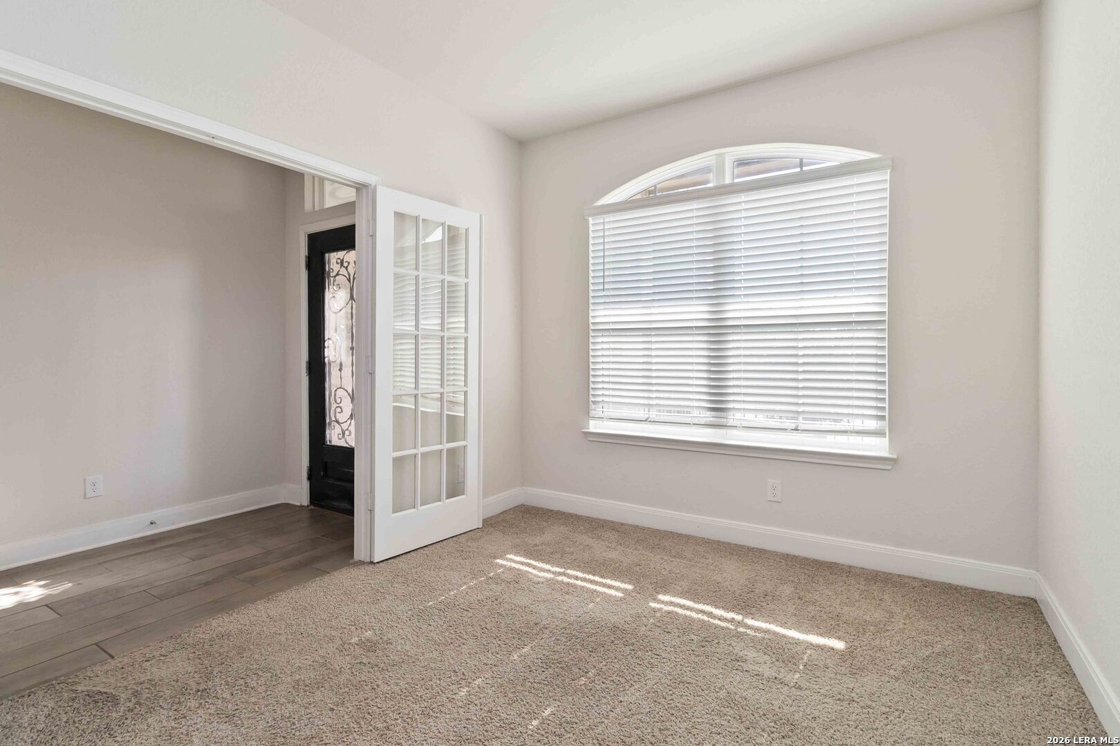 3335 Iron Canyon Bulverde, TX 78163 - Photo 4 of 17 a view of an empty room with a window