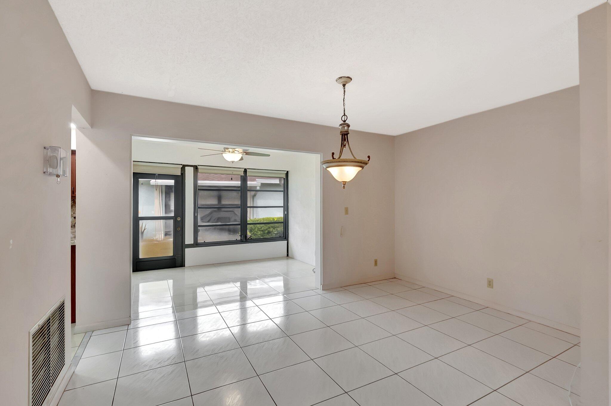 9765 Pecan Tree Drive, Unit B Boynton Beach, FL 33436 - Photo 12 of 35 DINING/LIVING