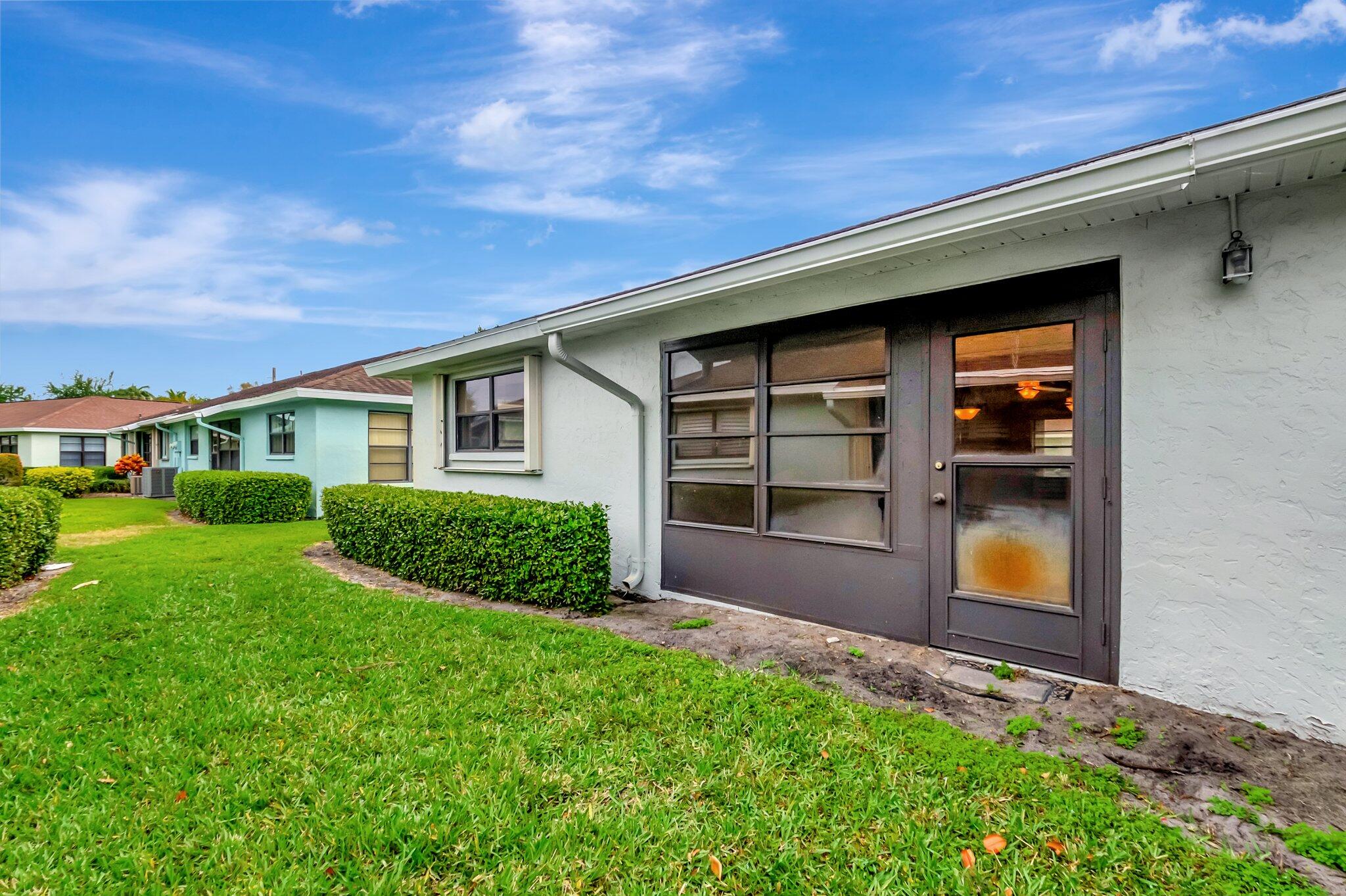 9765 Pecan Tree Drive, Unit B Boynton Beach, FL 33436 - Photo 29 of 35 Back Exterior