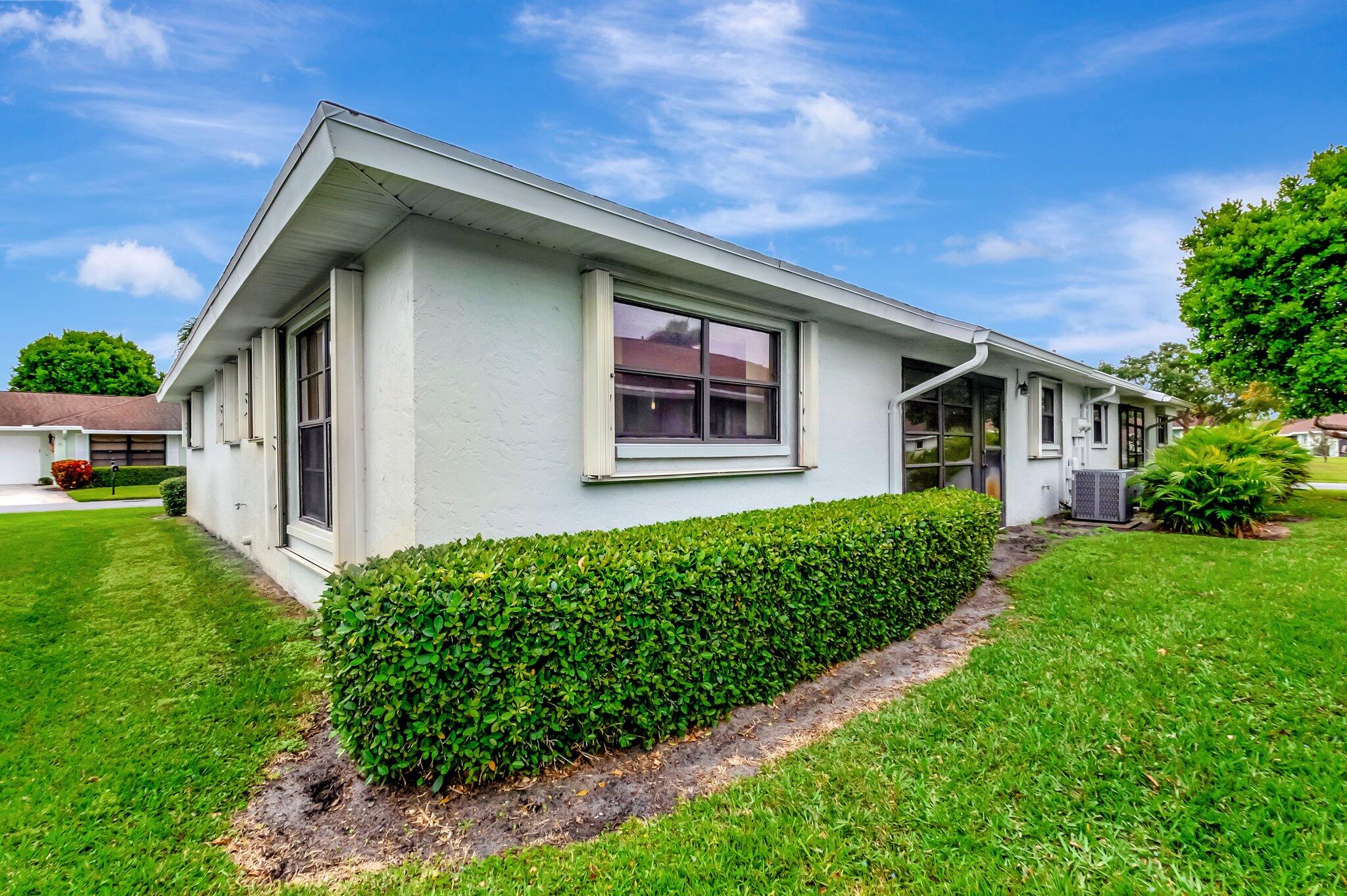 9765 Pecan Tree Drive, Unit B Boynton Beach, FL 33436 - Photo 30 of 35 Back Exterior