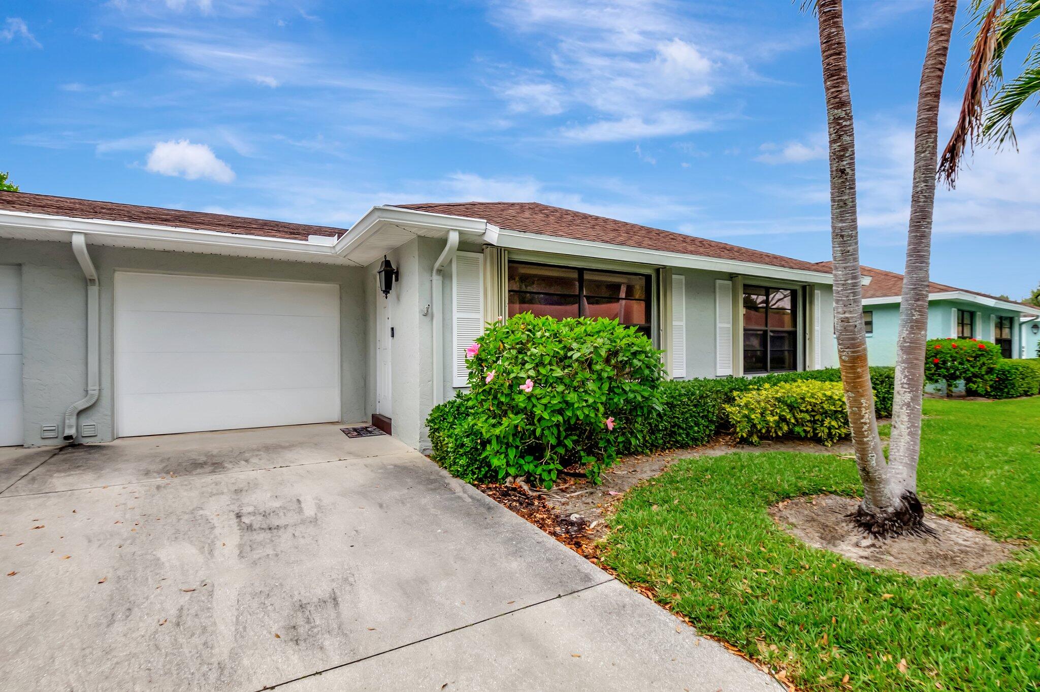 9765 Pecan Tree Drive, Unit B Boynton Beach, FL 33436 - Photo 3 of 35 Front Exterior