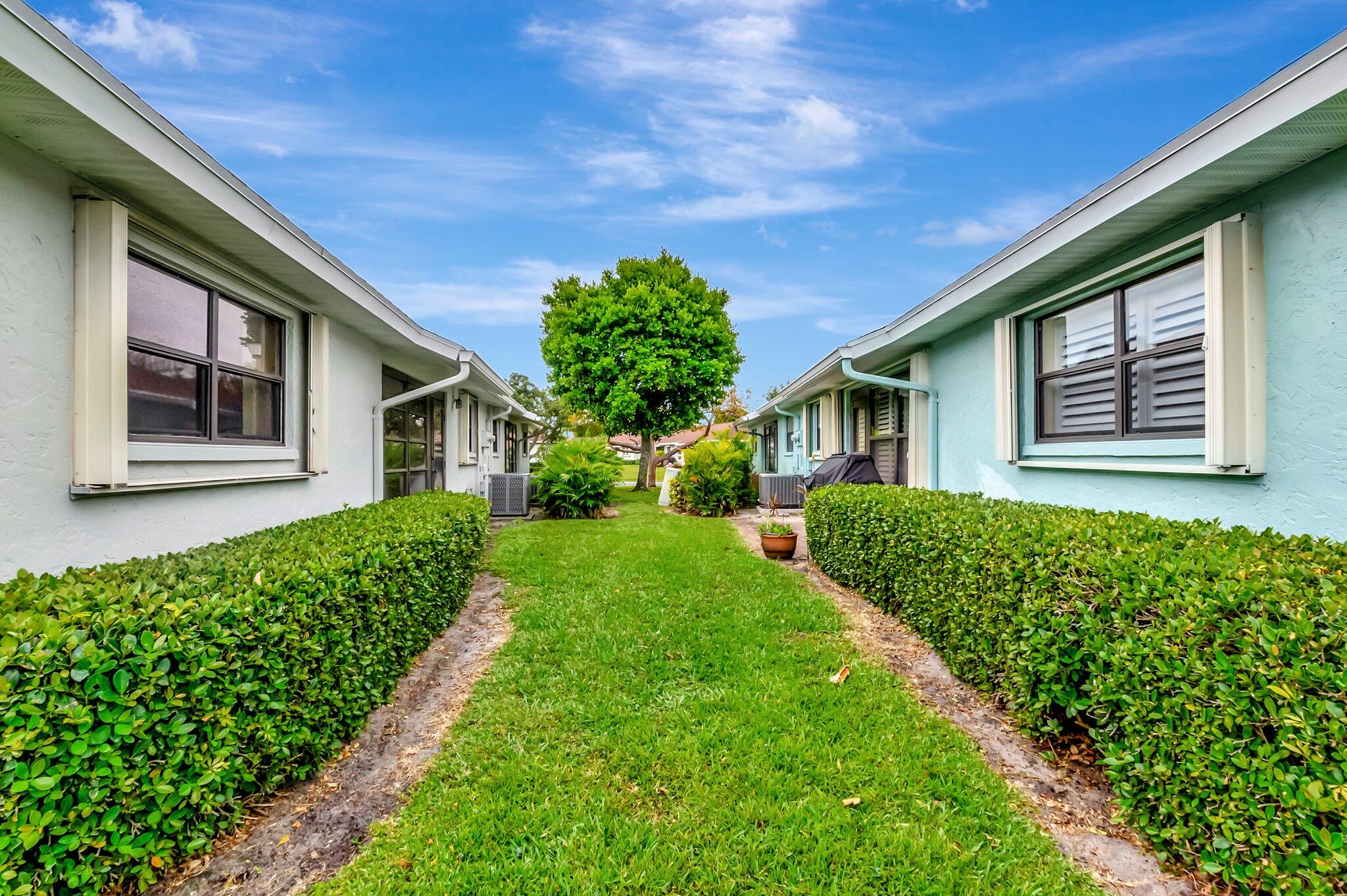 9765 Pecan Tree Drive, Unit B Boynton Beach, FL 33436 - Photo 31 of 35 Back Exterior