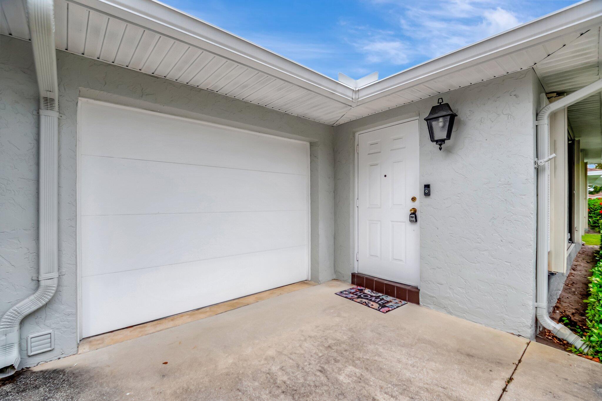 9765 Pecan Tree Drive, Unit B Boynton Beach, FL 33436 - Photo 32 of 35 Front Entrance