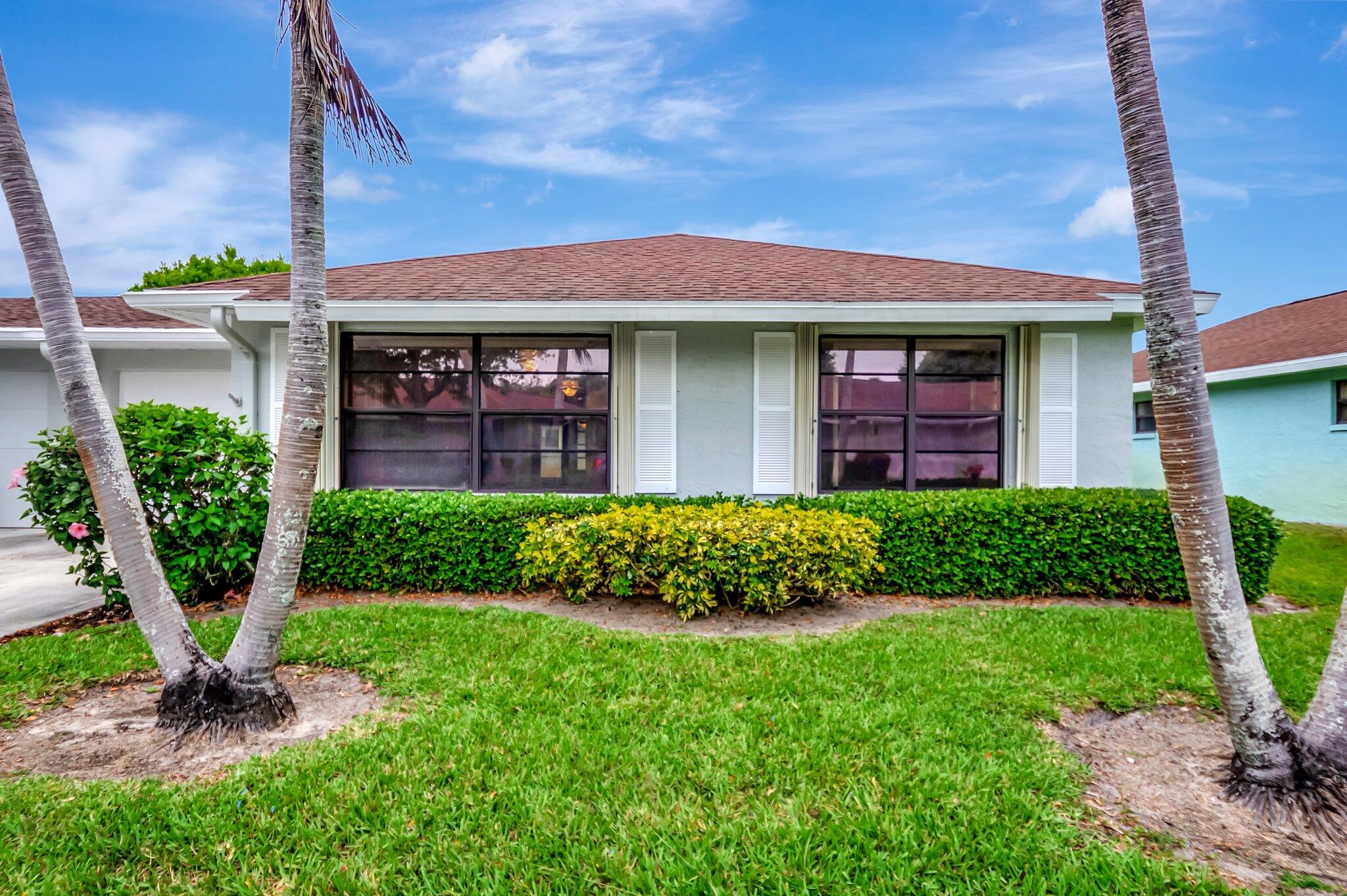 9765 Pecan Tree Drive, Unit B Boynton Beach, FL 33436 - Photo 35 of 35 Front Exterior