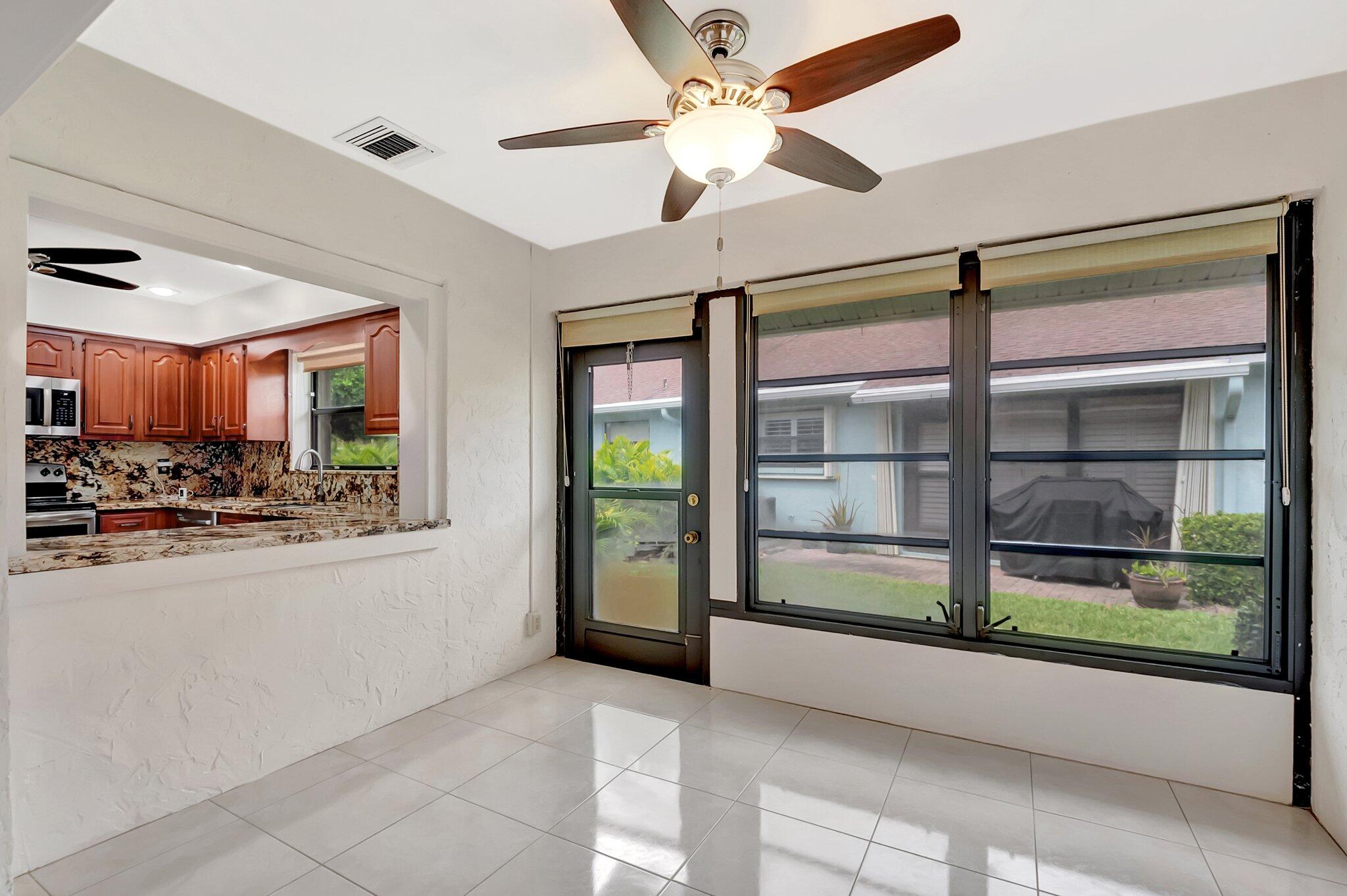 9765 Pecan Tree Drive, Unit B Boynton Beach, FL 33436 - Photo 9 of 35 Florida room opened up