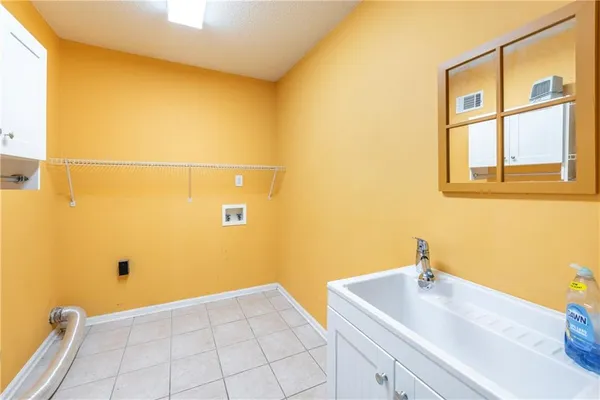 a bathroom with a sink and a tub