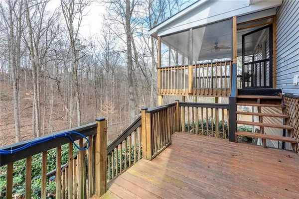 a view of a wooden balcony with wooden floor