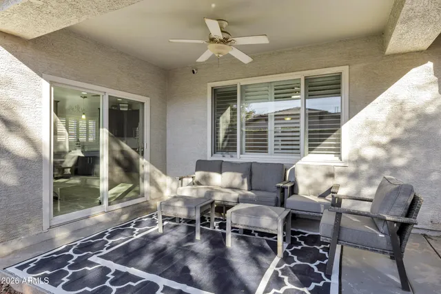 a living room with furniture and a window