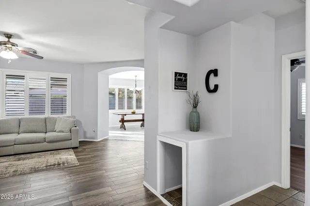 a living room with furniture and a window