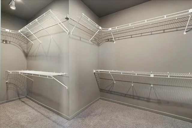 a view of a room with racks on the wall