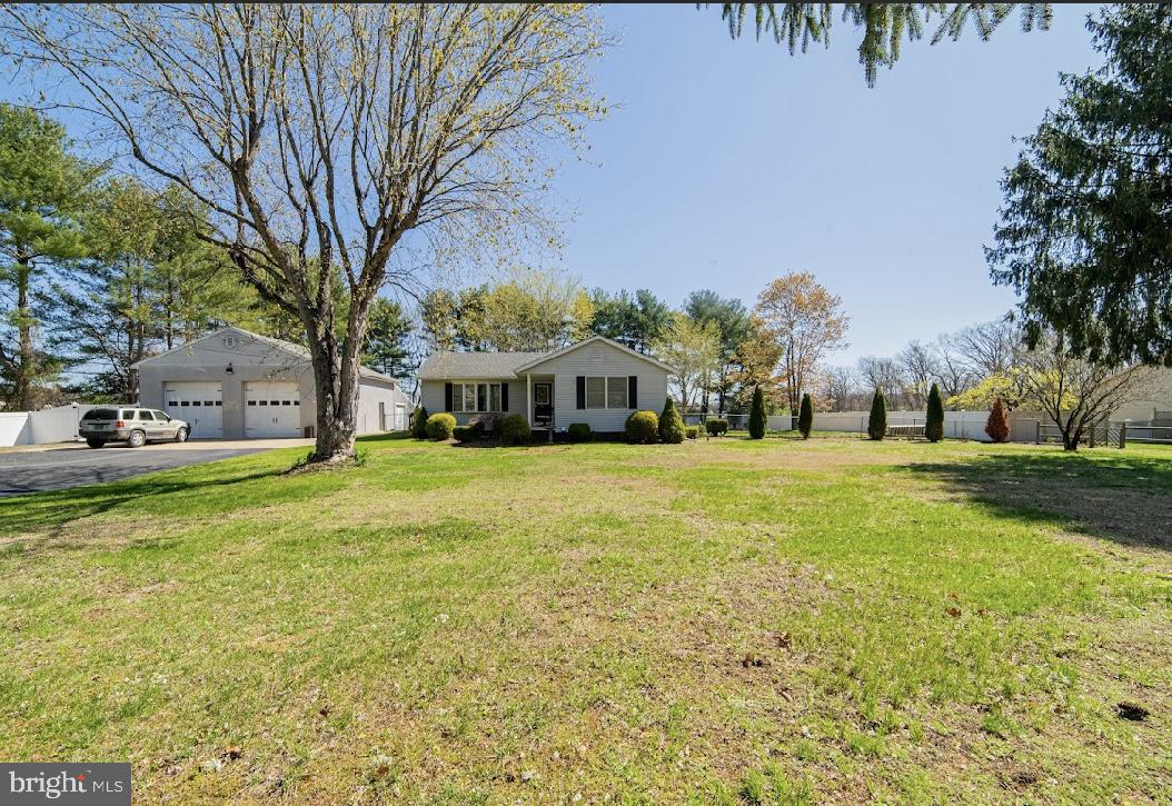 a house view with swimming pool