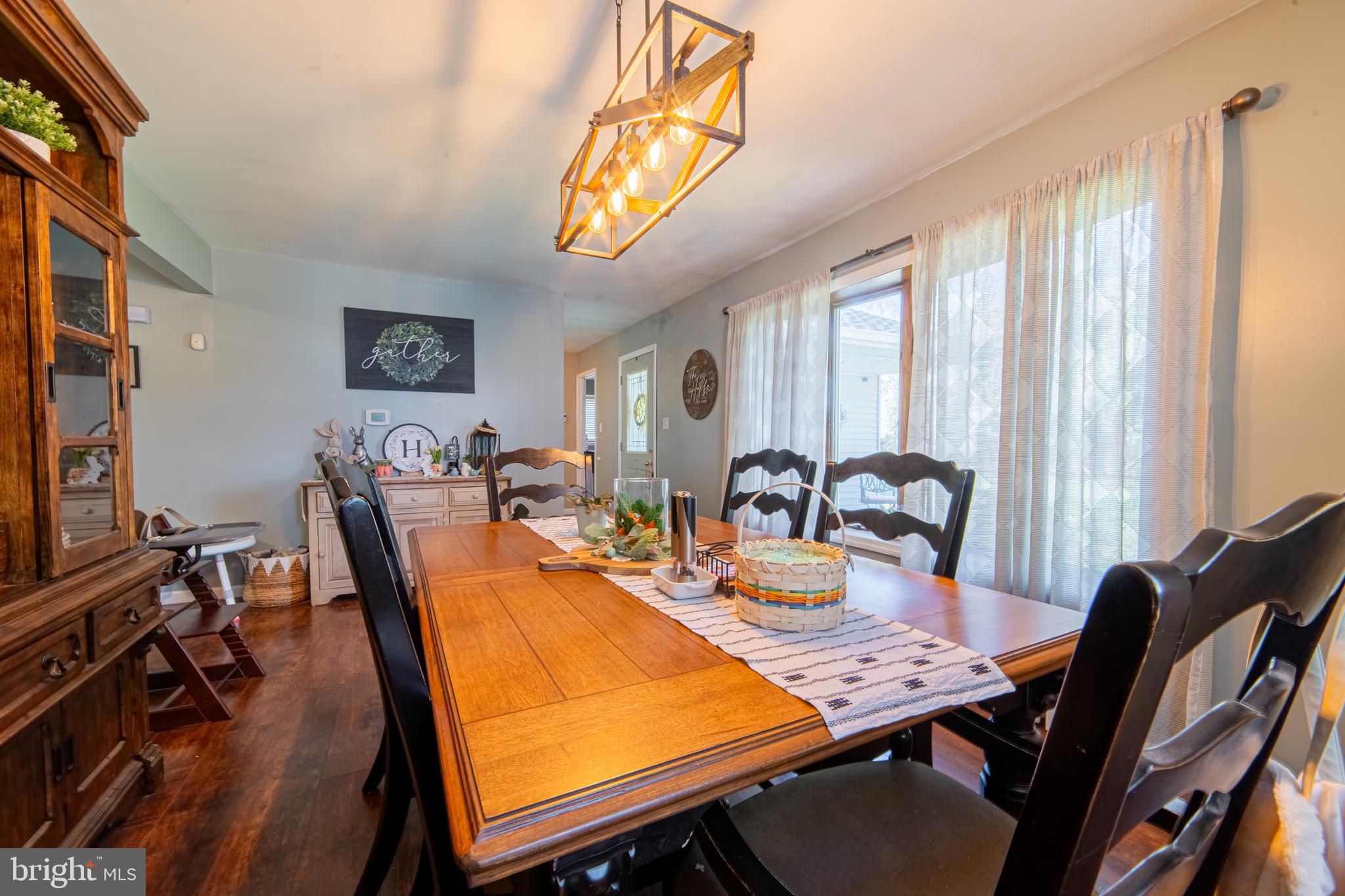 49 Husted Station Road Bridgeton, NJ 08302 - Photo 15 of 33 a view of a dining room with furniture window and wooden floor