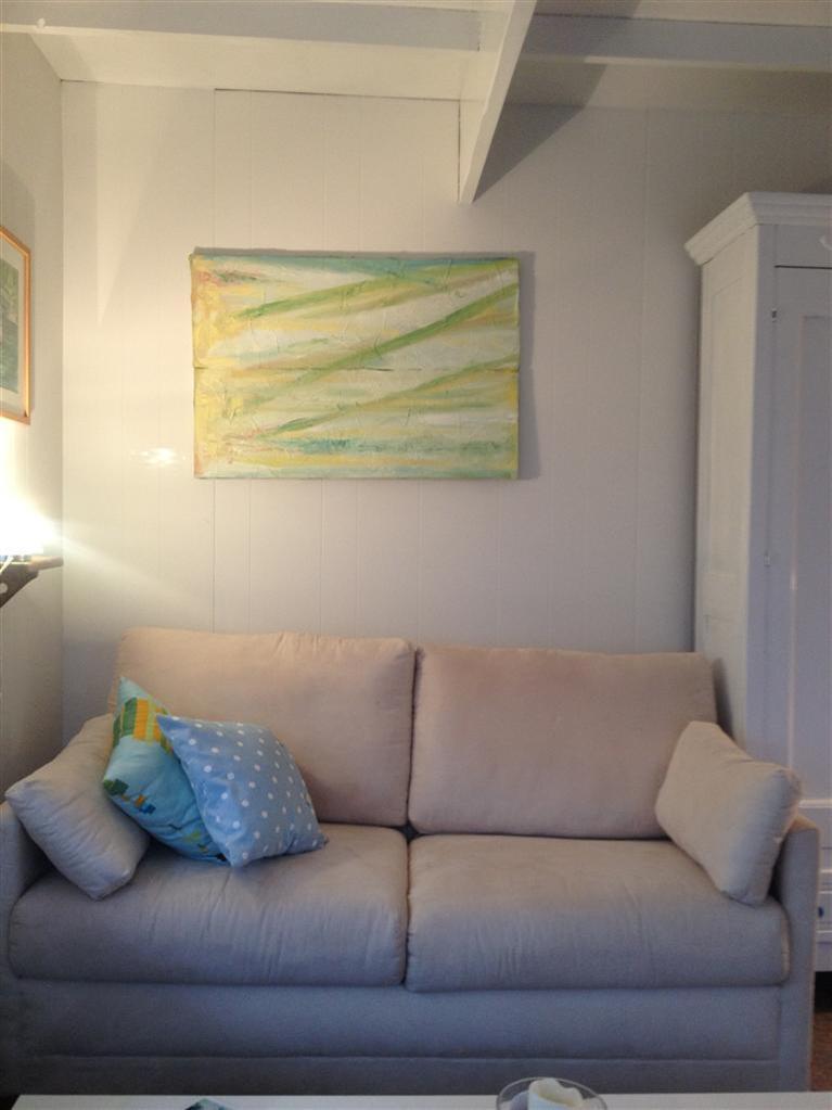 169 Shore Road, Unit 19 Truro, MA 02666 - Photo 6 of 15 a living room with a couch
