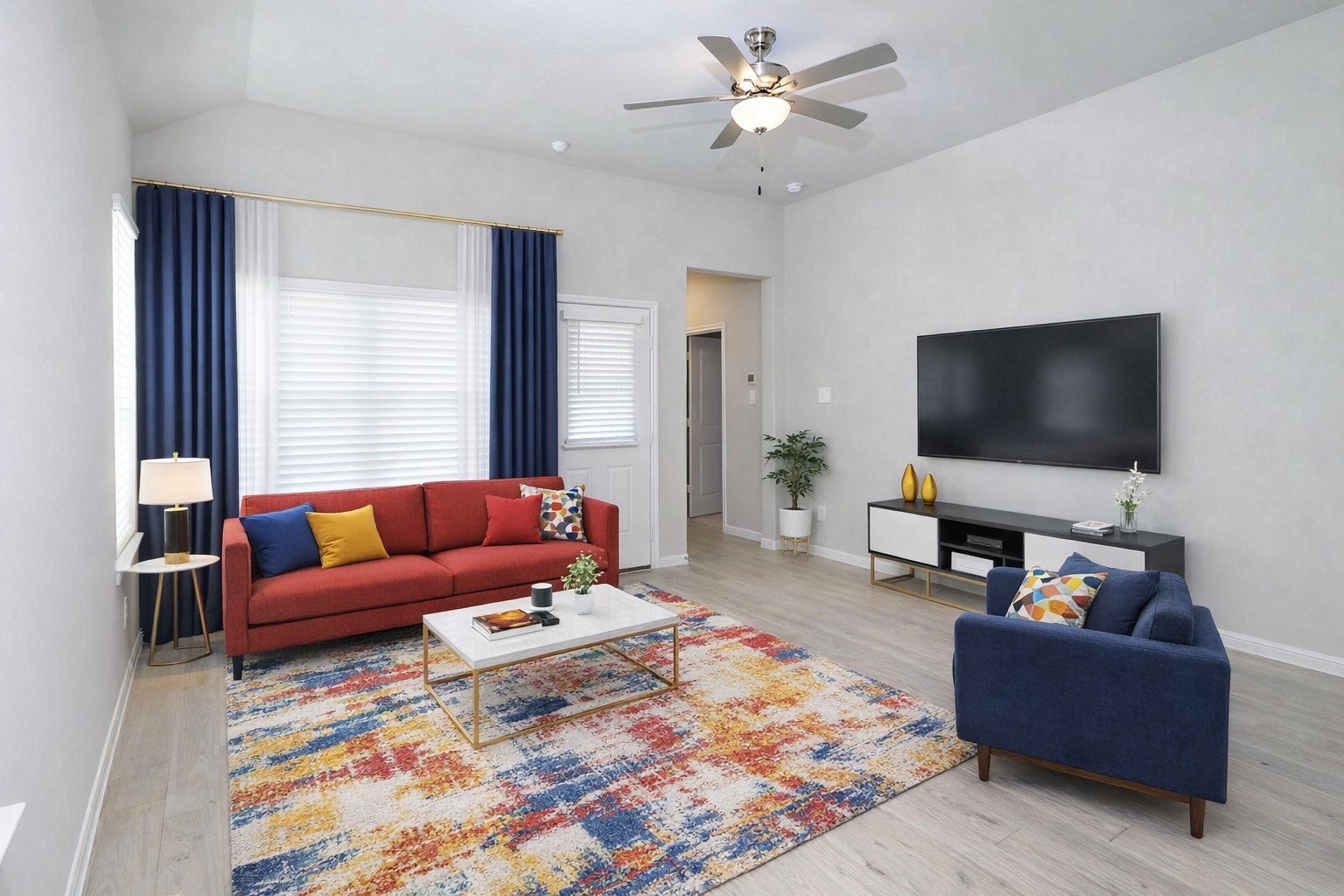 9254 Sea Gdn Street Houston, TX 77034 - Photo 13 of 33 a living room with furniture and a flat screen tv