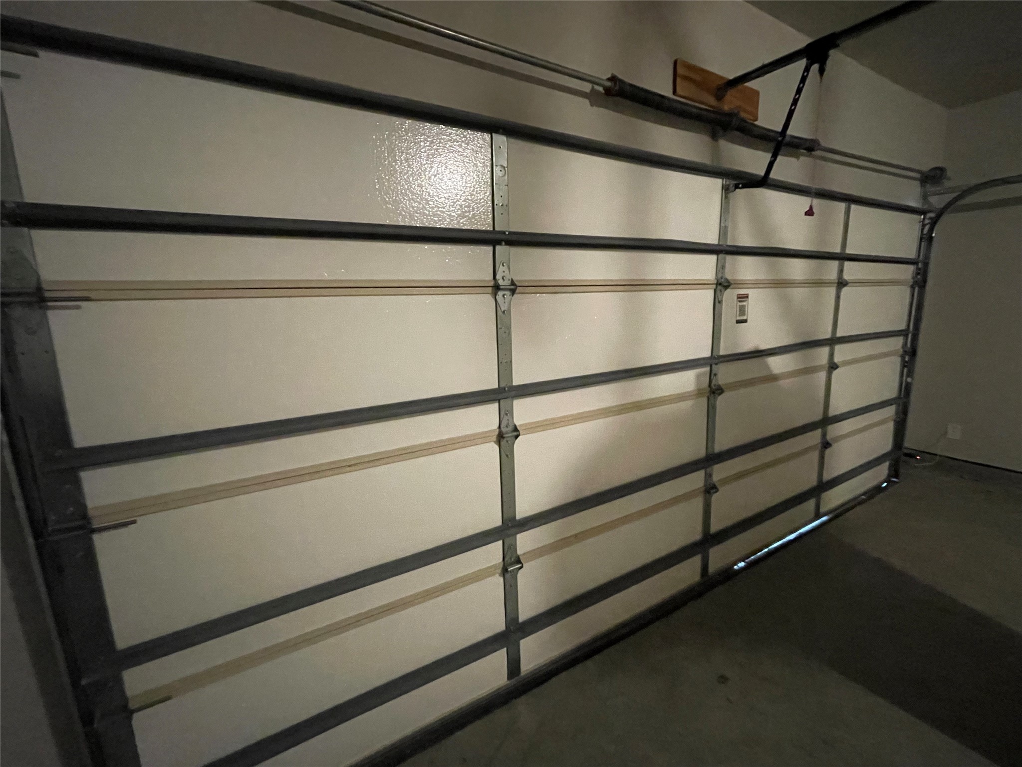 9254 Sea Gdn Street Houston, TX 77034 - Photo 29 of 33 a view of a room with racks on the wall