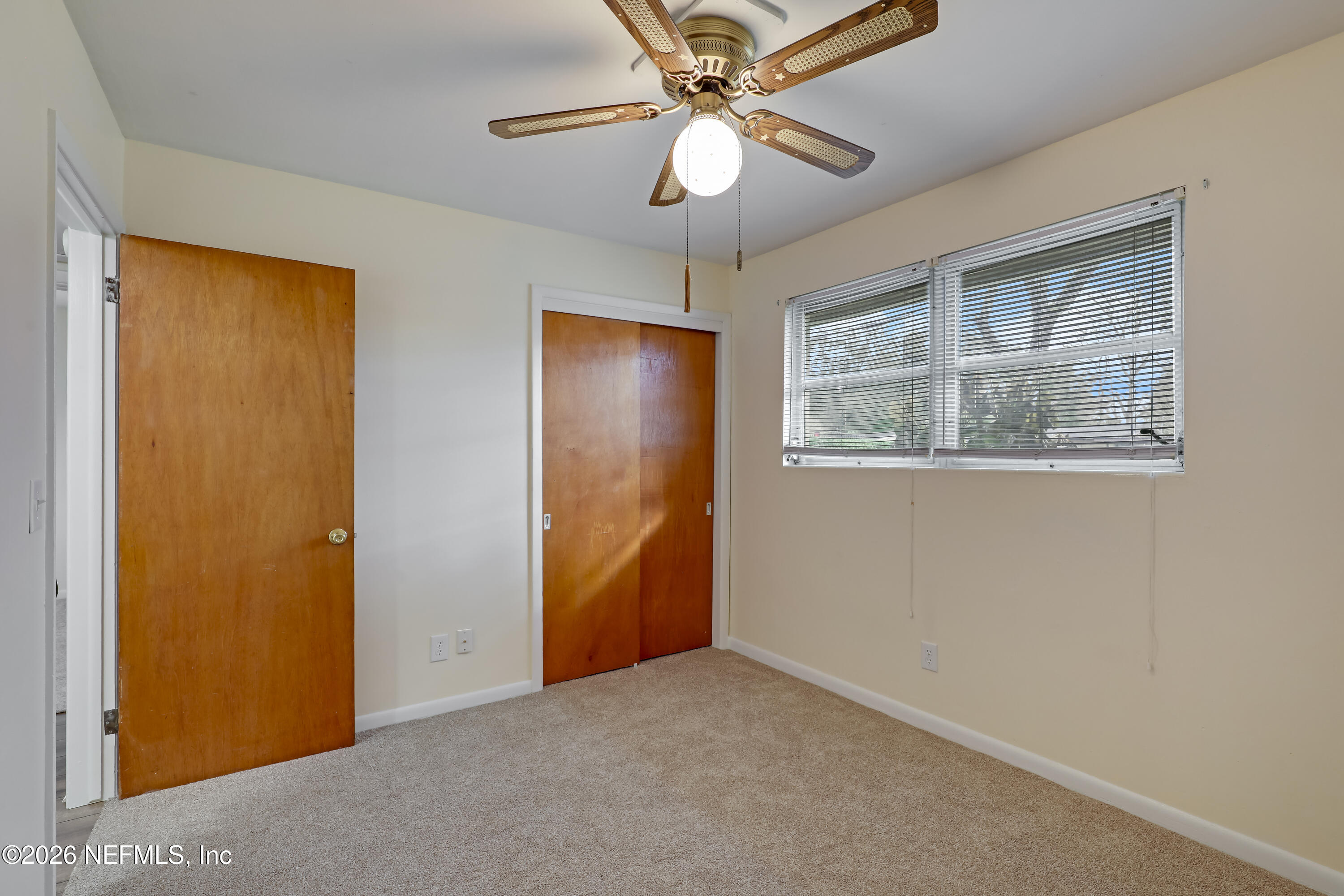 3944 Rodby Drive Jacksonville, FL 32210 - Photo 16 of 40 a view of an empty room with a window