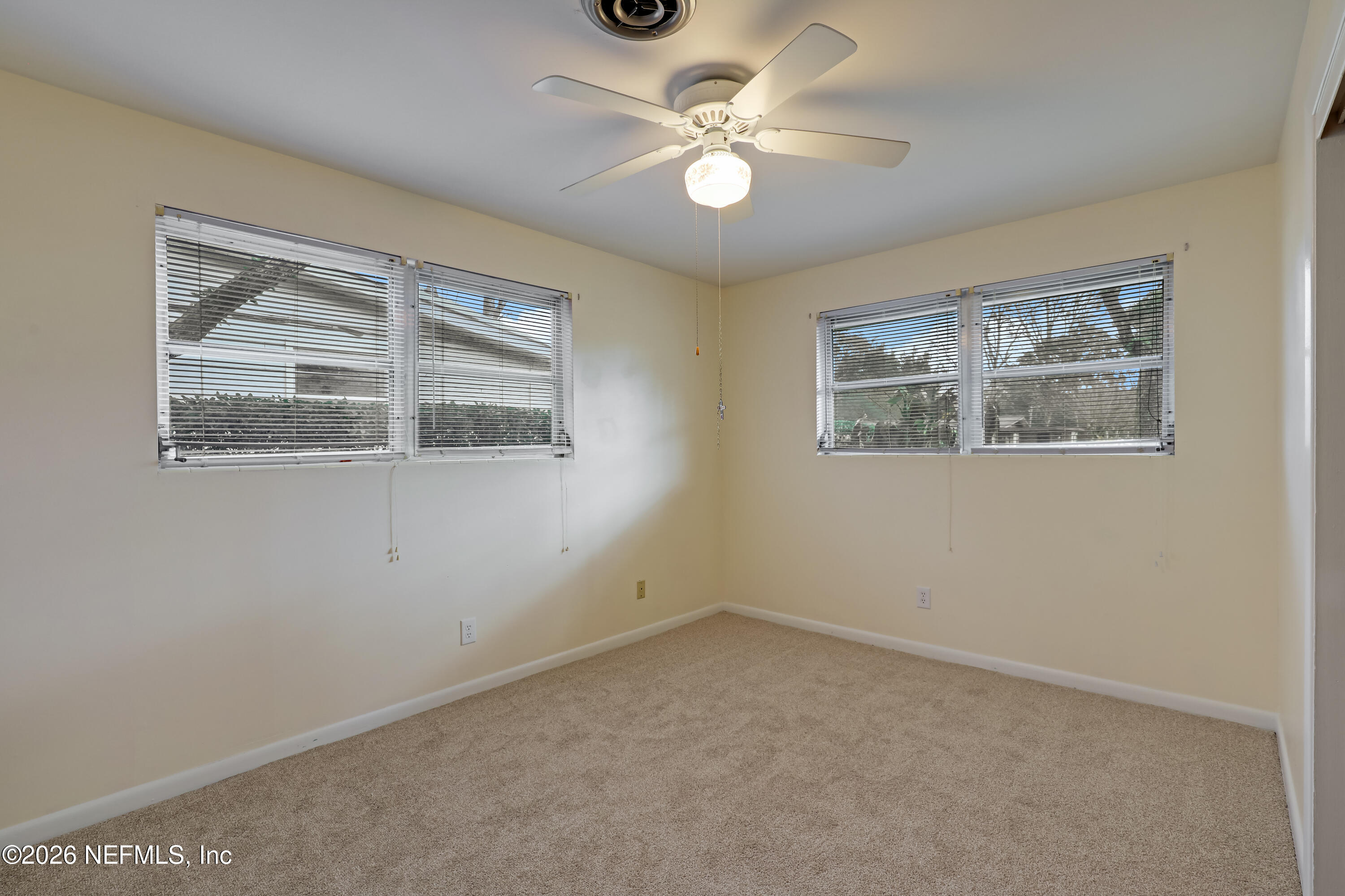 3944 Rodby Drive Jacksonville, FL 32210 - Photo 18 of 40 a view of an empty room with a window