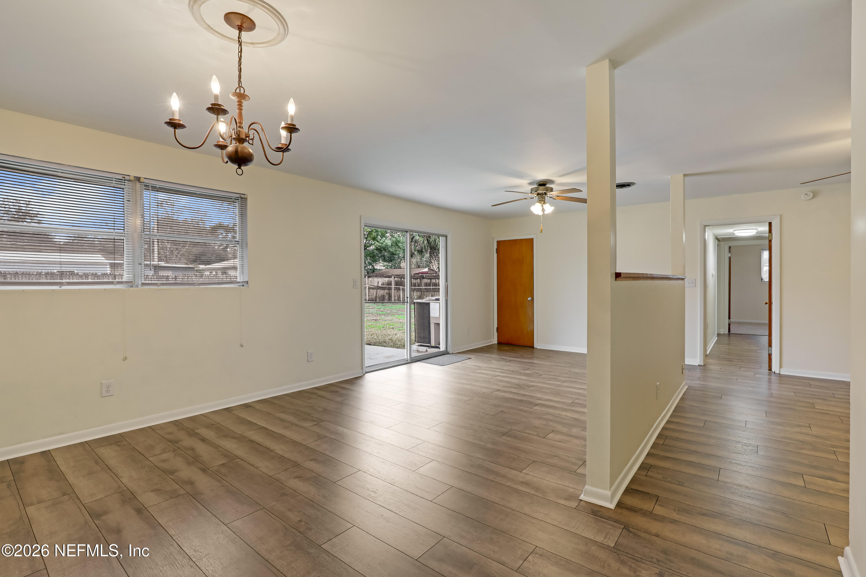 3944 Rodby Drive Jacksonville, FL 32210 - Photo 27 of 40 a view of a livingroom with wooden floor