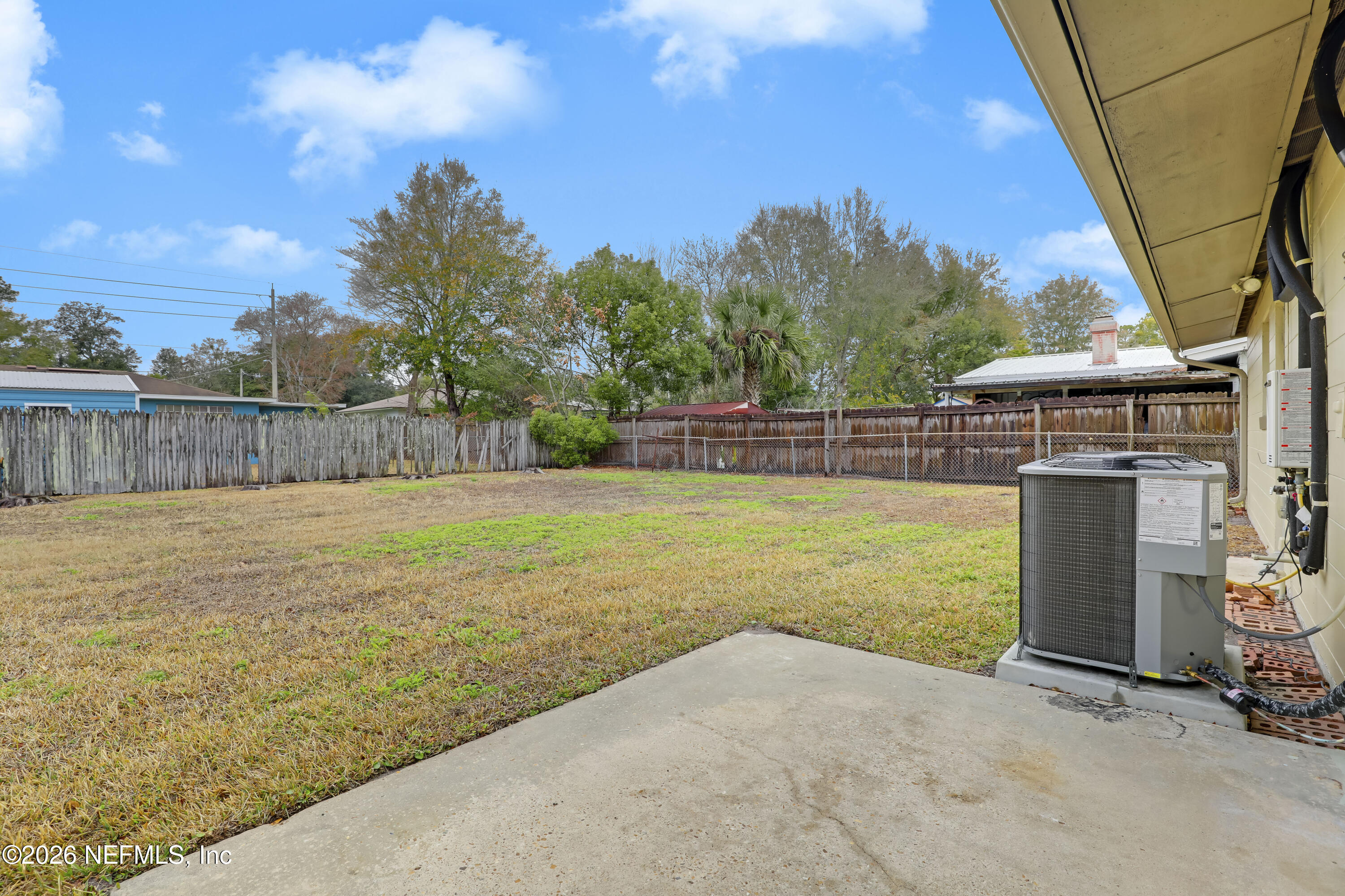 3944 Rodby Drive Jacksonville, FL 32210 - Photo 35 of 40 a view of swimming pool with a yard