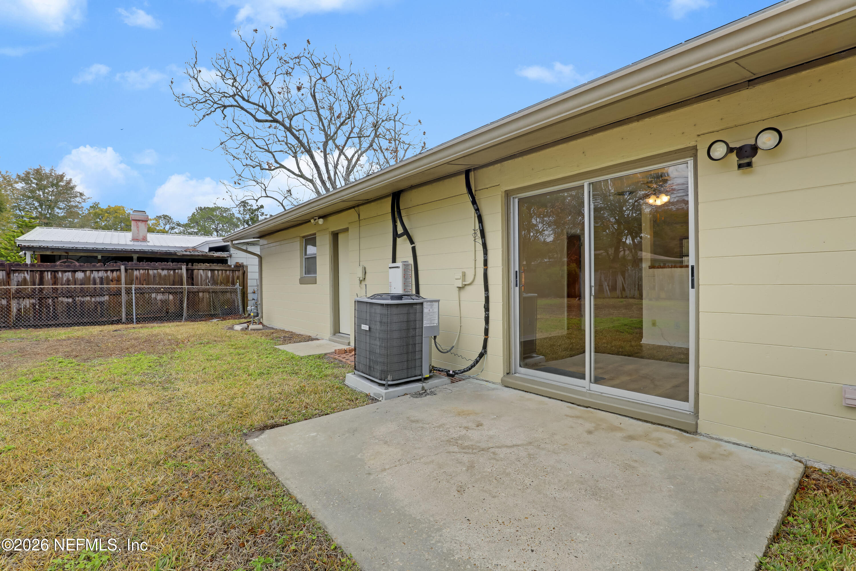 3944 Rodby Drive Jacksonville, FL 32210 - Photo 36 of 40 a view of a house with a backyard