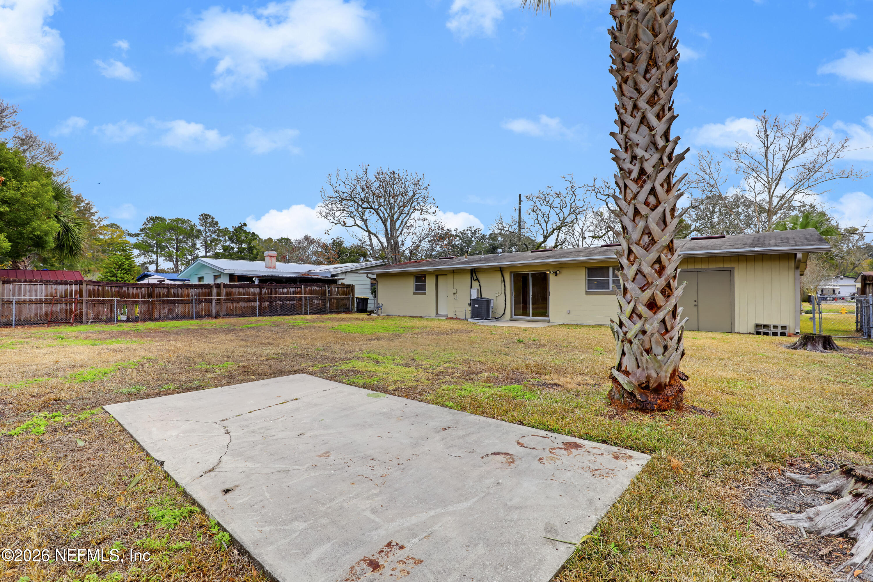3944 Rodby Drive Jacksonville, FL 32210 - Photo 39 of 40 a view of a house with a swimming pool
