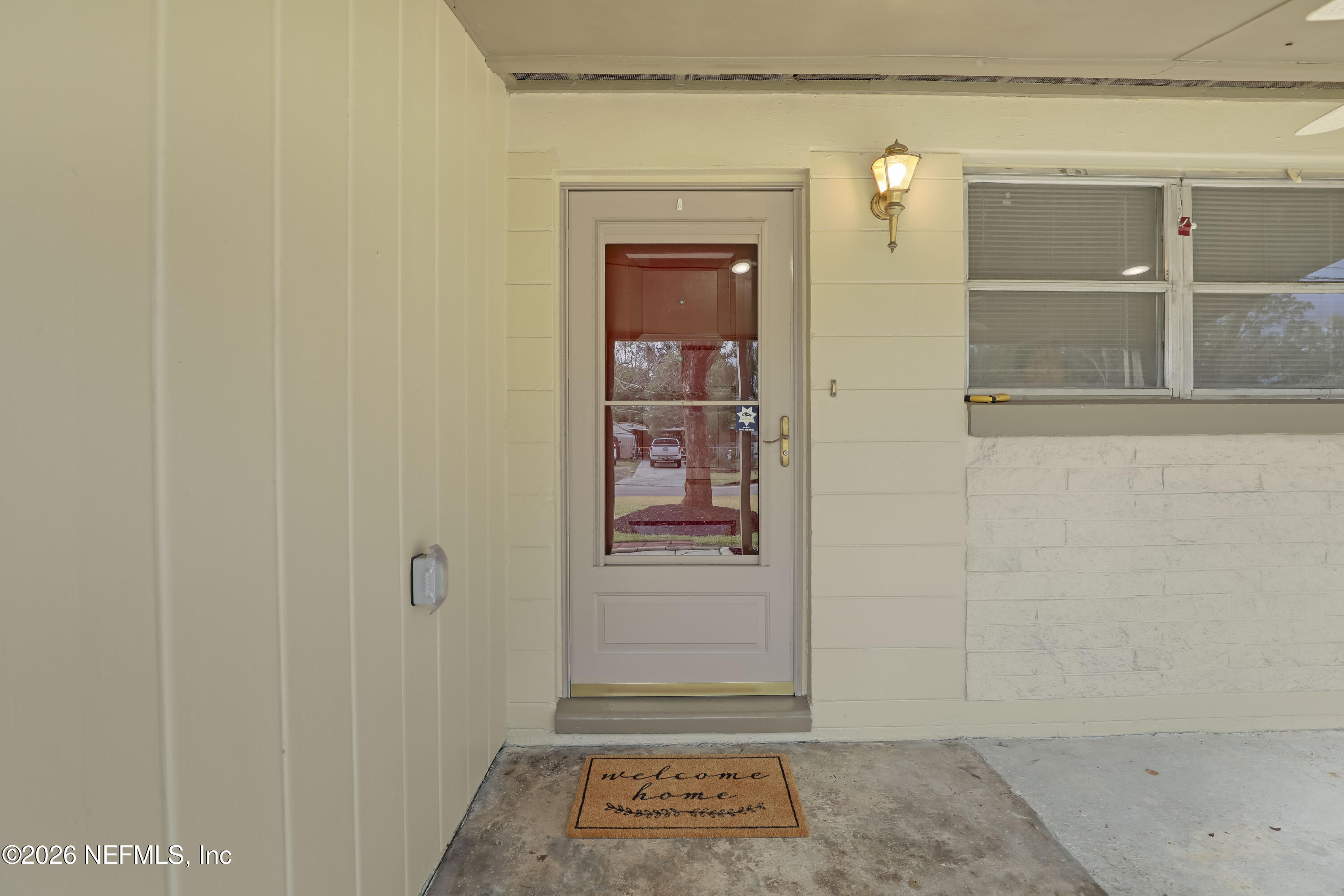 3944 Rodby Drive Jacksonville, FL 32210 - Photo 10 of 40 a view of front door of a house