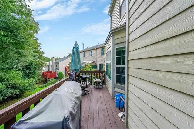a balcony view with a seating space
