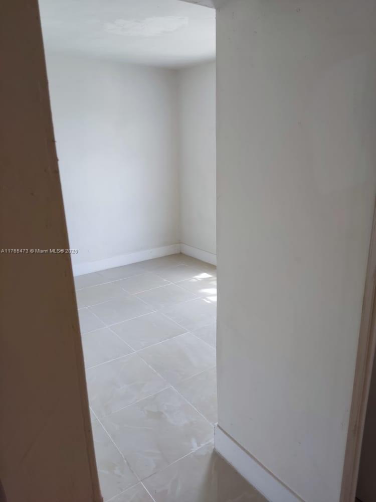 900 Northwest 80th Street Miami, FL 33150 - Photo 11 of 11 close up of a white marble wall