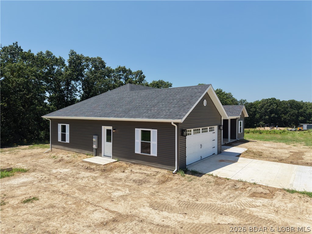 7 Oak Tree Lane Eldon, MO 65026 - Photo 50 of 59 Garage side of house