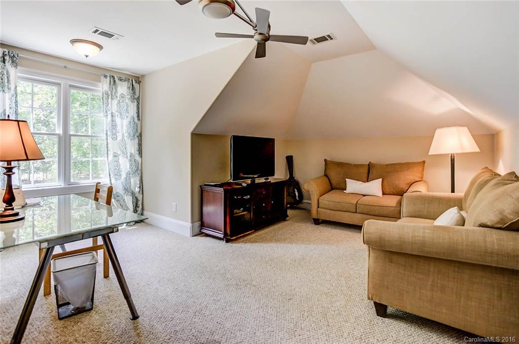 5908 Johnson Road Clover, SC 29710 - Photo 16 of 23 a living room with furniture and a flat screen tv