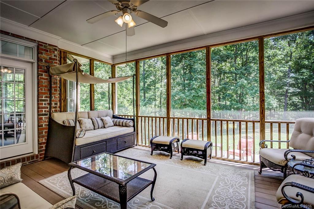 5908 Johnson Road Clover, SC 29710 - Photo 20 of 23 a living room with furniture and a floor to ceiling window