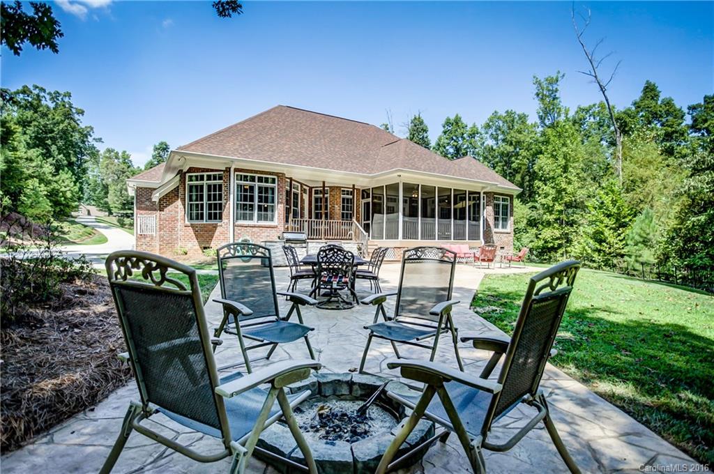5908 Johnson Road Clover, SC 29710 - Photo 21 of 23 a view of a patio with table and chairs and potted plants