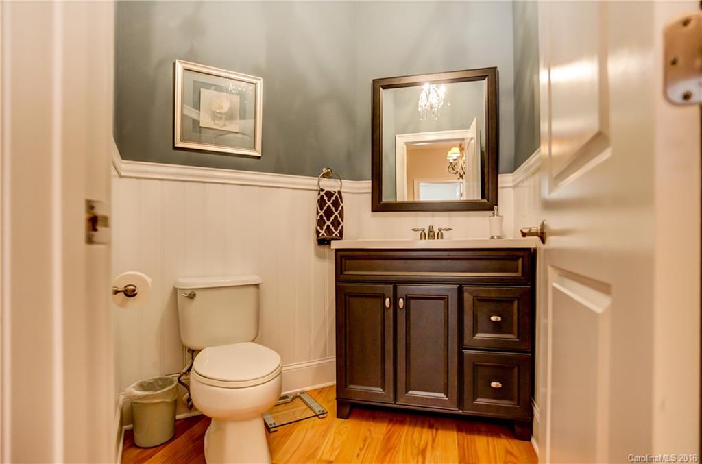 5908 Johnson Road Clover, SC 29710 - Photo 7 of 23 a bathroom with a toilet sink and mirror