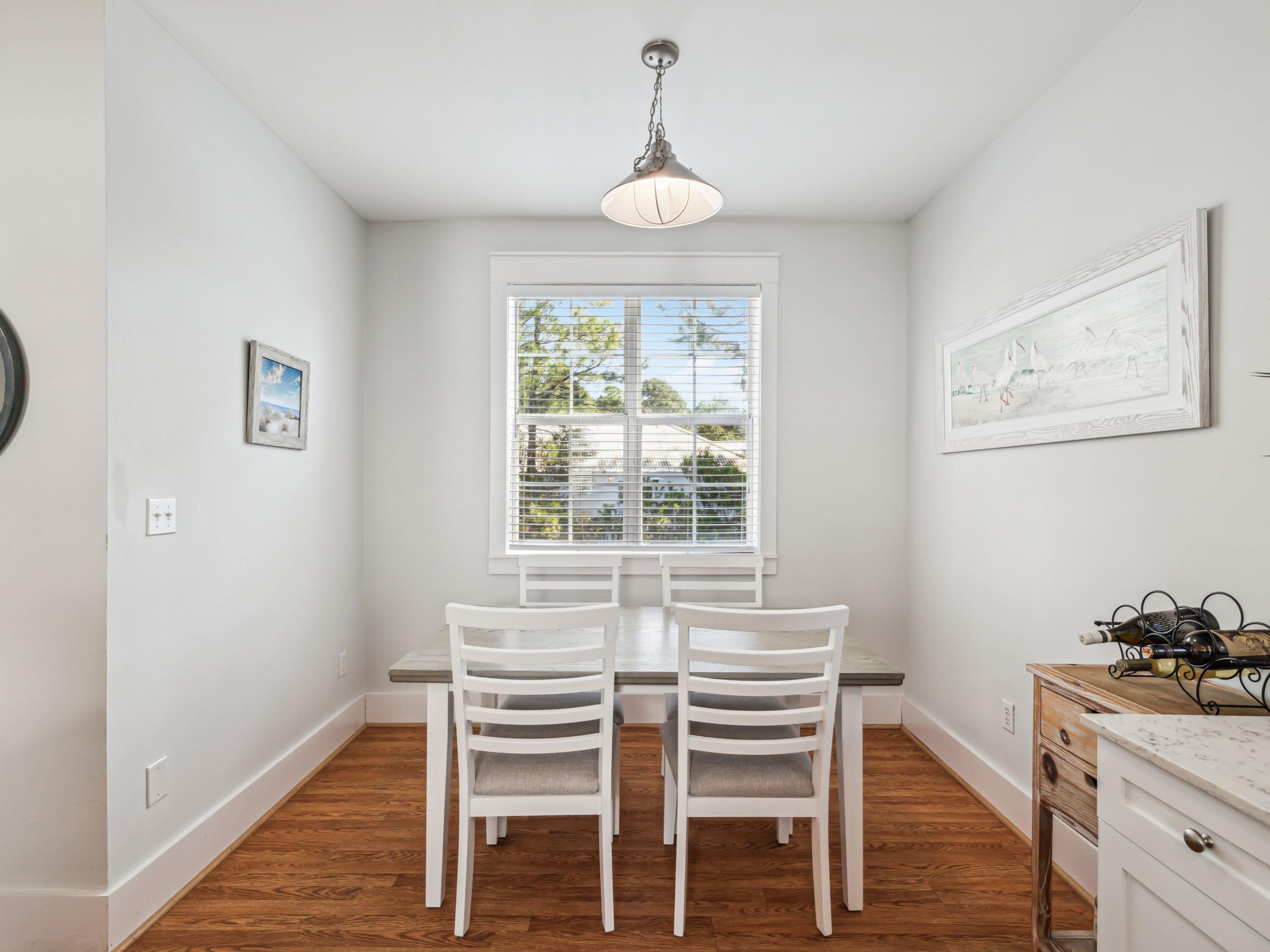 198 Somerset Bridge Road, Unit 103 Santa Rosa Beach, FL 32459 - Photo 15 of 39 a dining room with furniture and window