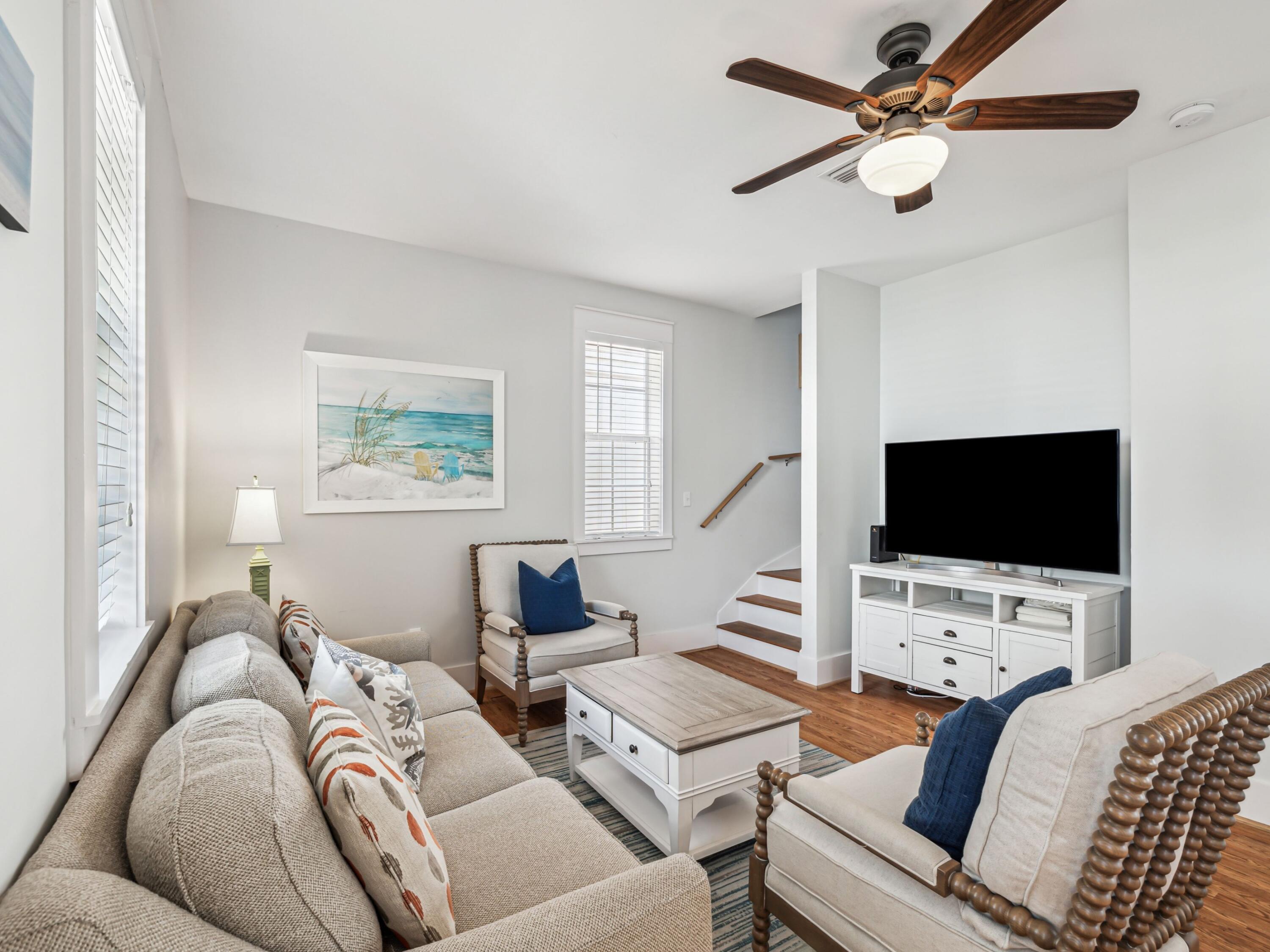 198 Somerset Bridge Road, Unit 103 Santa Rosa Beach, FL 32459 - Photo 17 of 39 a living room with furniture a flat screen tv and a window