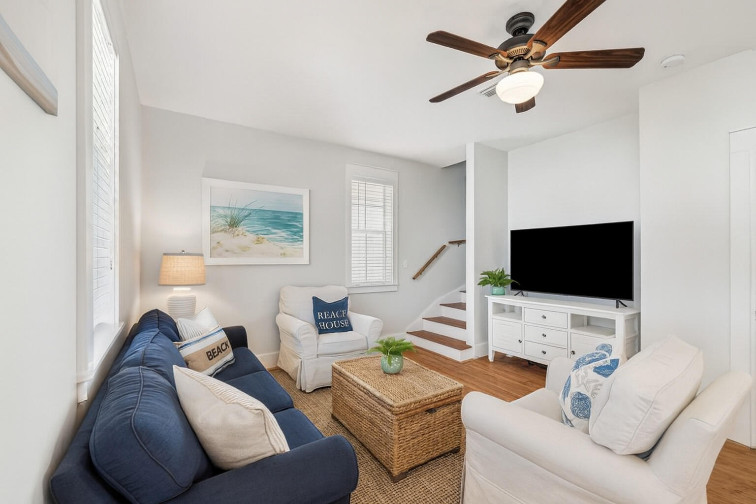 198 Somerset Bridge Road, Unit 103 Santa Rosa Beach, FL 32459 - Photo 18 of 39 a living room with furniture and a flat screen tv