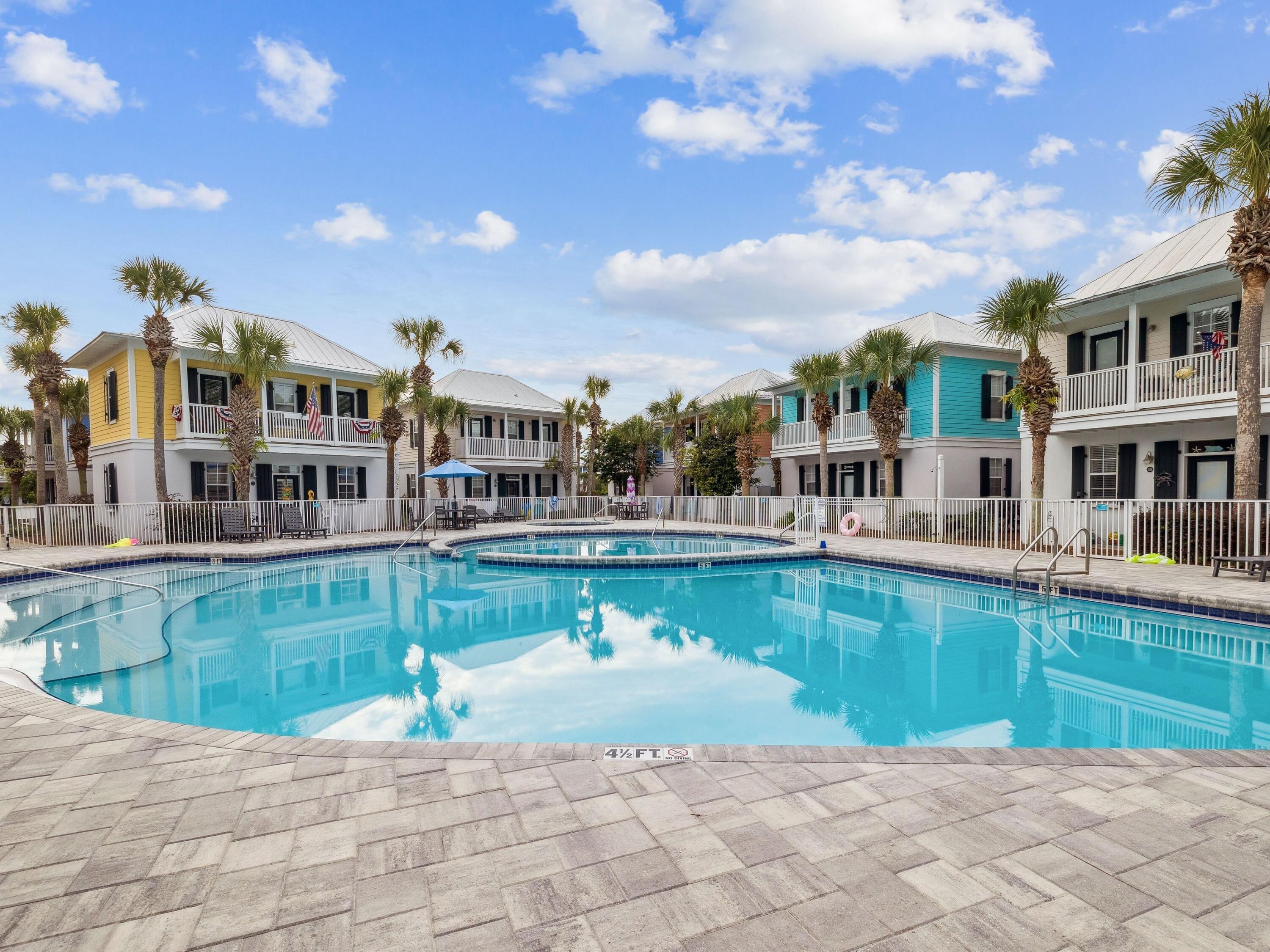 198 Somerset Bridge Road, Unit 103 Santa Rosa Beach, FL 32459 - Photo 2 of 39 a view of a house with a swimming pool
