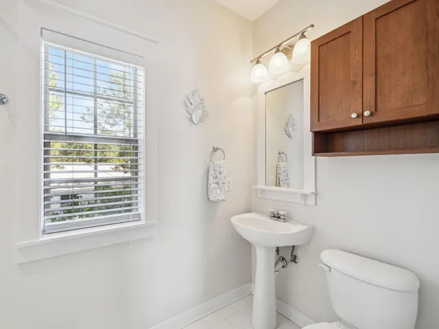 a view of a swimming pool with a lounge chair